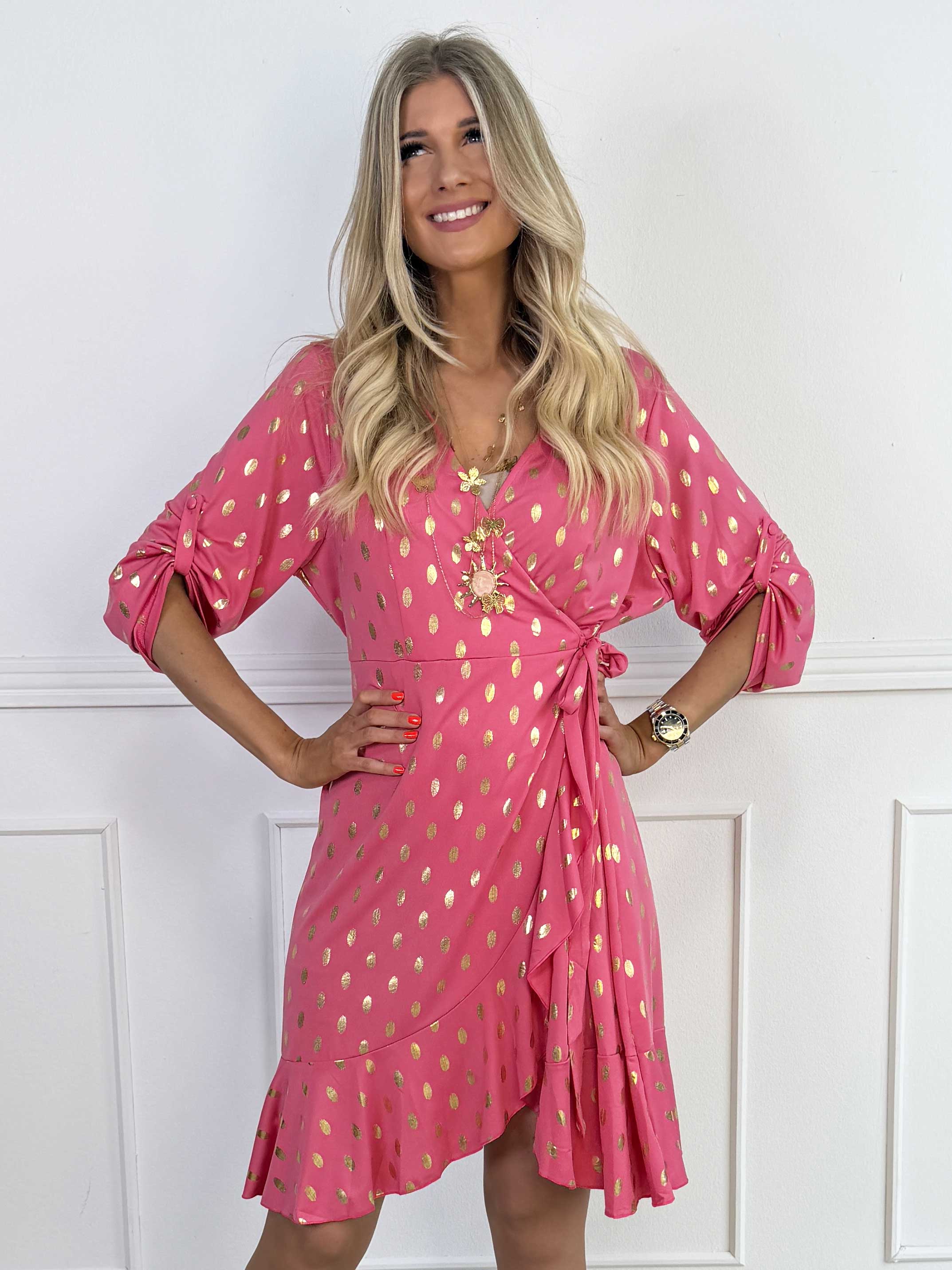 Savina Gold - Elastisk kjole i slå-om-look med guld dutter